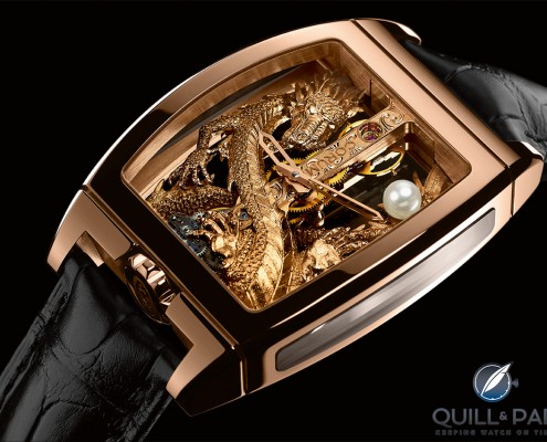 The meticulously engraved dragon wraps around the movement of the Corum Golden Bridge