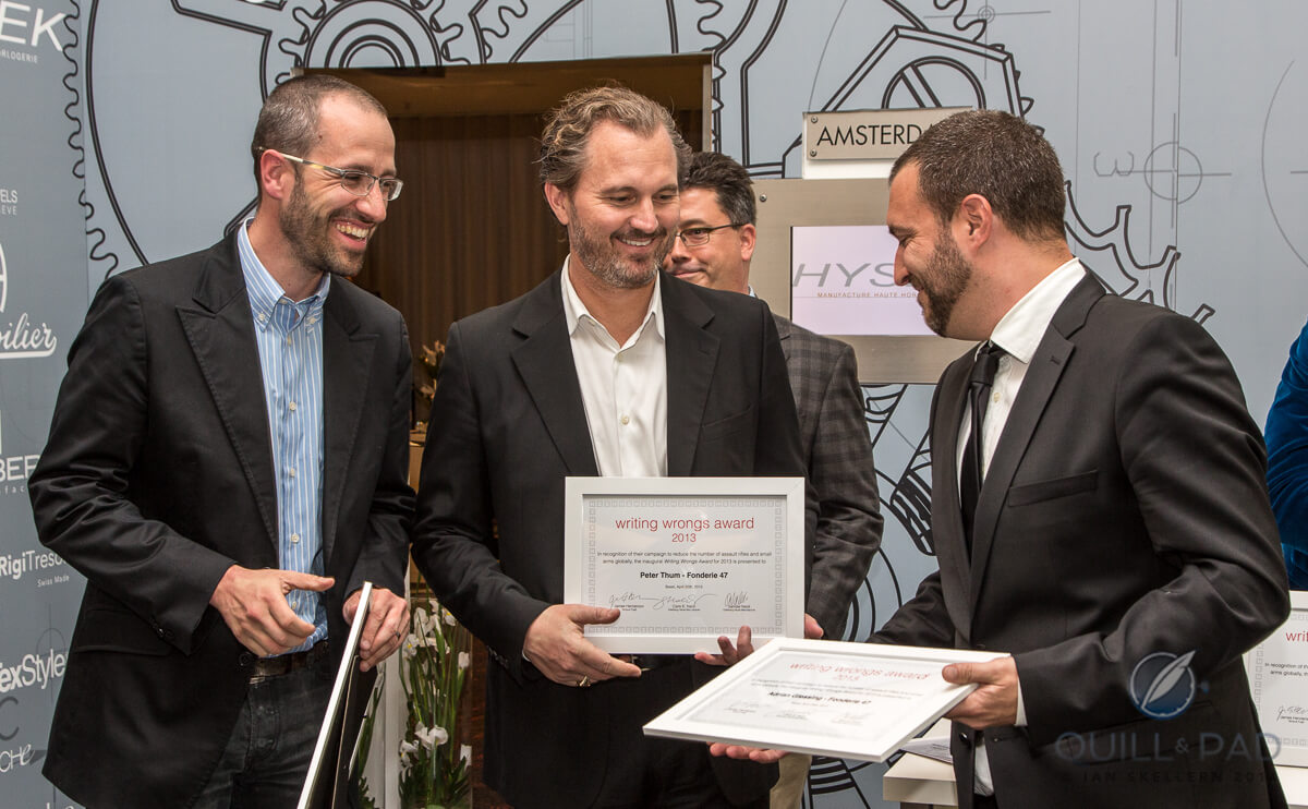 L-R: Davide Candaux (Inversion Principle constructor/watchmaker), Peter Thum (Fonderie 47 founder),Adrian Glessing (designer) accepting the Tempus Fugit's inaugural 'Writing Wrongs' Award at Baselworld 2013.