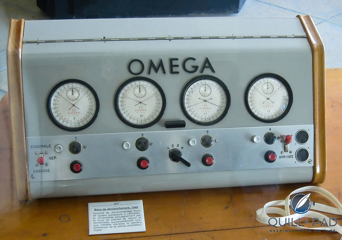 Fully automatic time device by Omega, 1948. This system contains four separate chronometers triggered by starting guns and stopped by a photo cell.