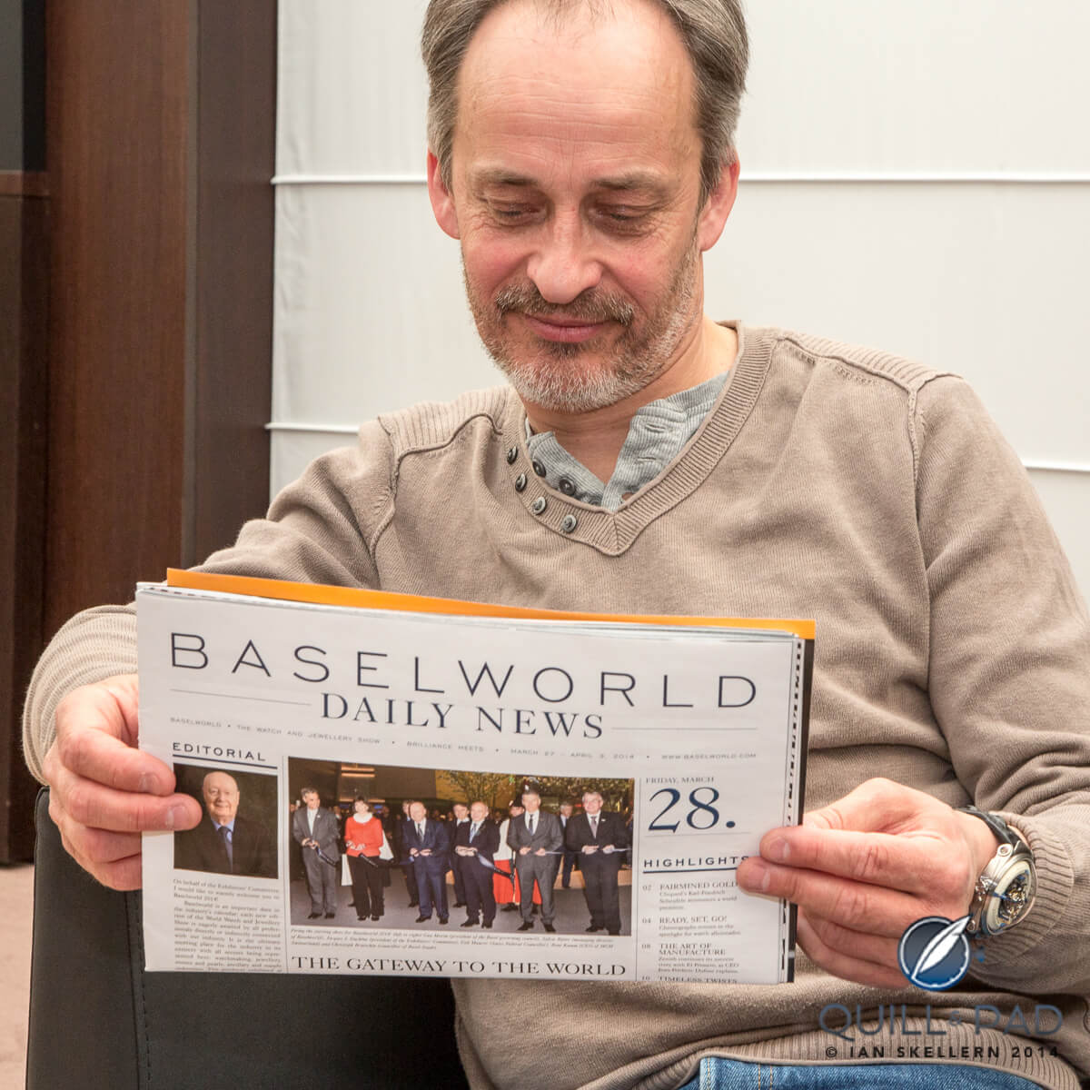 Vianney Halter reading the Baselworld Daily News wearing his Deep Space tourbillon