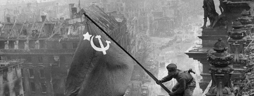 Yevgeny Khaldei's original photo of the Soviet flag being raised on the Reichstag, the German parliament building in the center of Berlin