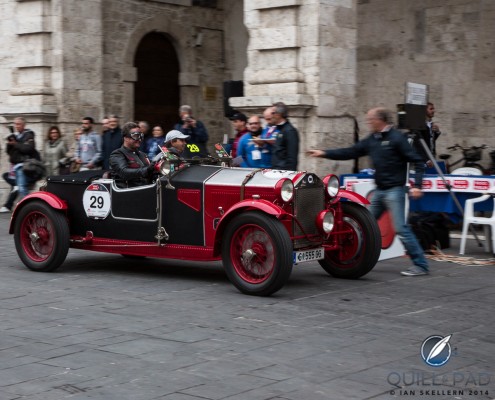 1927 Lancia series VII crossing a time trial line in the 2014 Mille Miglia