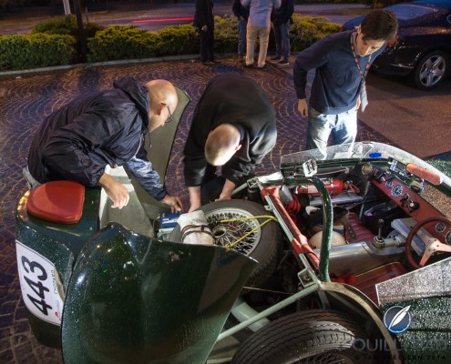 Pitstop for new battery for a 1957 Lotus Eleven Climax Le Mans in the 2014 Mille Miglia