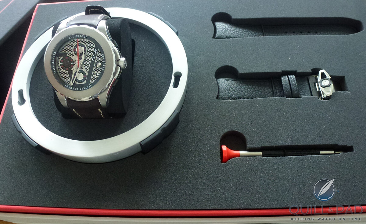 The case of the Valbray EL 1 Chrono with spare straps and tool for easy strap replacement