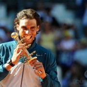 A very pleased Rafael Nadal with the Ion Tiriac Trophy after winning the 2014 Mutua Madrid Open . Phozo courtesy ATP