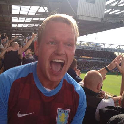 Mike Pearson passionately cheering on his football team, Aston Villa