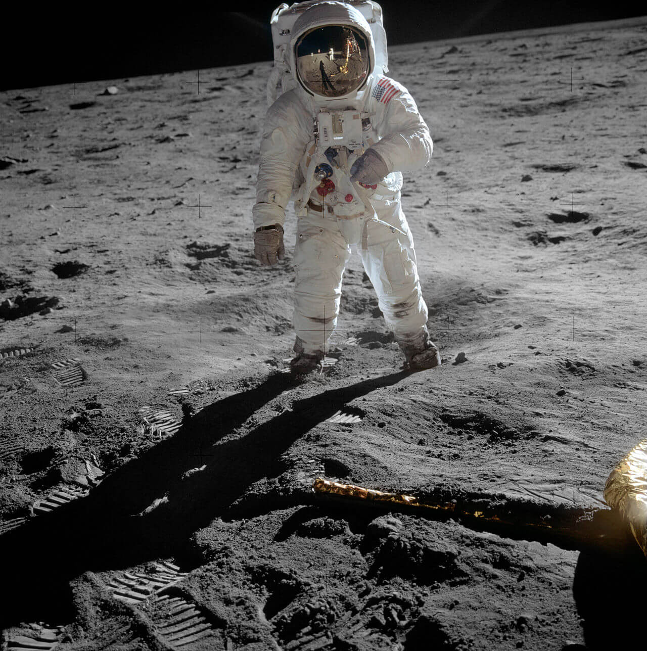 Photo of Buzz Aldrin on the moon taken by Neil Armstrong who is reflected in Aldrin's visor
