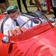 Sir Jackie Stewart in a 1955 Maserati 250F Monoposto at the 2014 Pebble Beach Concours d'Elegance
