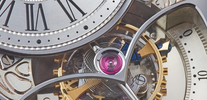 Exquisite tourbillon details of the Jean Daniel Nicolas Two-Minute Tourbillon by Mr. Daniel Roth. You can just make out the gold second hand on the left of tourbillon cage pointing to 60 and the blued-steel hand on the right pointing to 0.