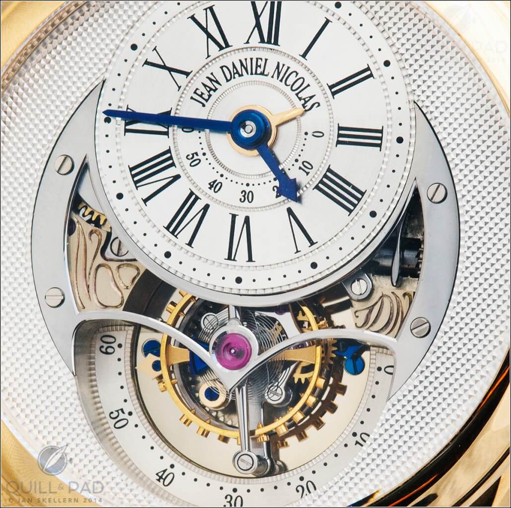 Exquisite dial details of the Jean Daniel Nicolas Two-Minute Tourbillon by Mr. Daniel Roth; the engraving on left is a stylized 
