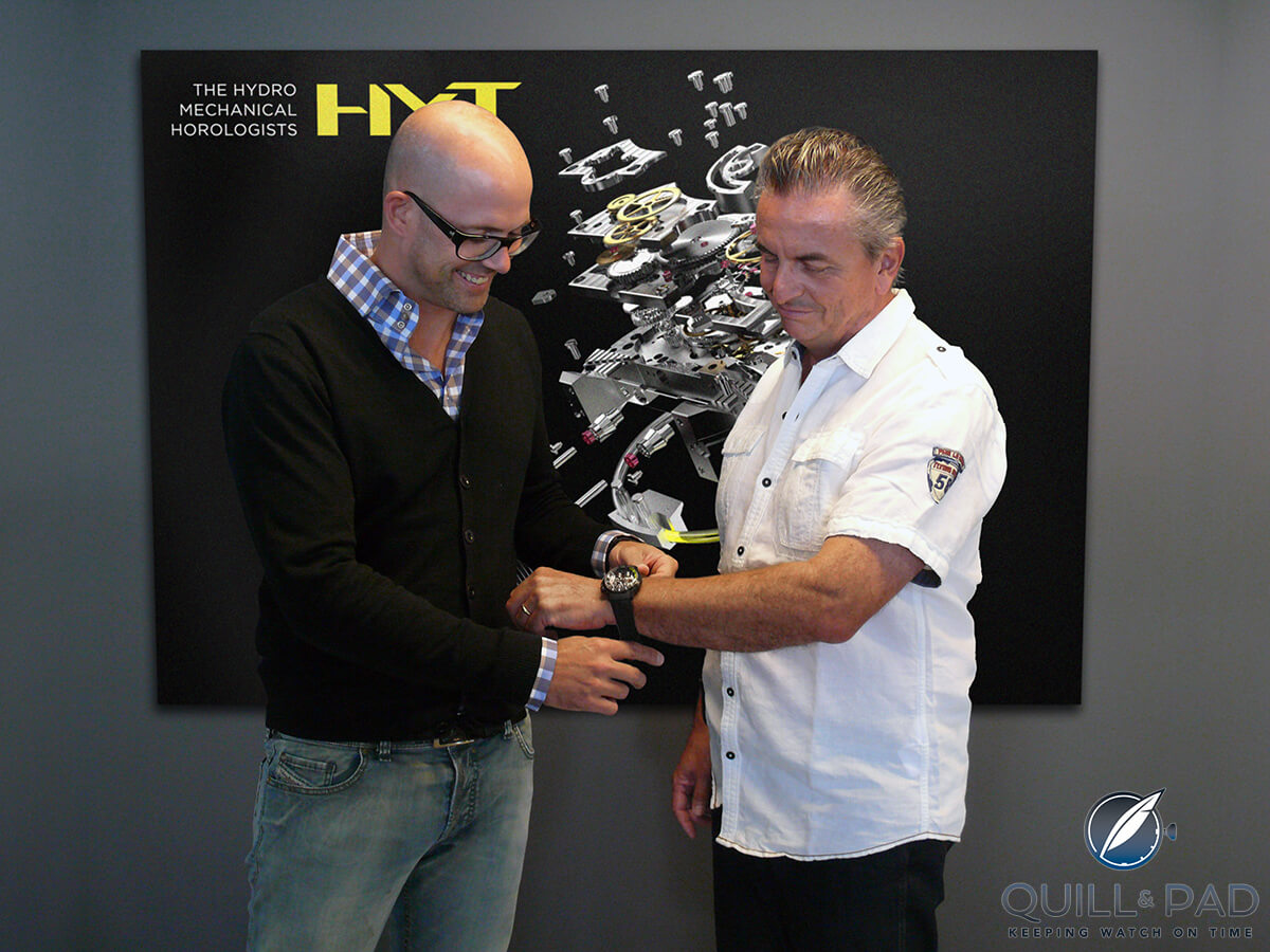 HYT CEO Vincent Perriard welcoming Dominique Renaud on board with a new watch