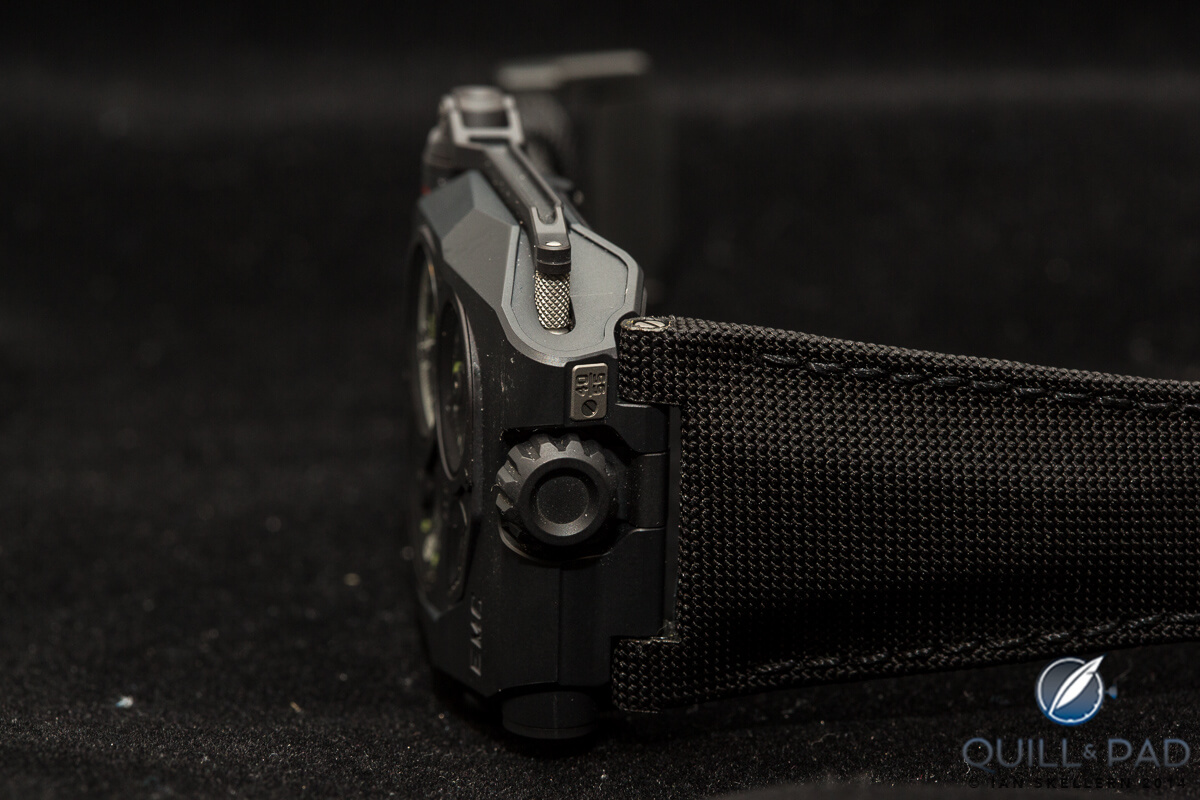 The power generation crank handle folds neatly and unobtrusively into the case of the Urwerk EMC Black