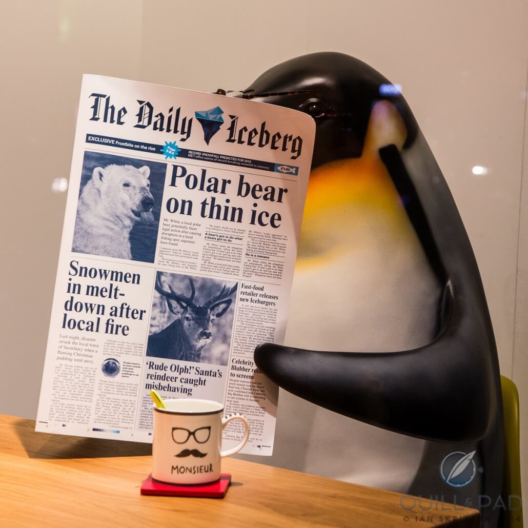 Penguin reading the morning paper in a window display at the Peter Jones department store in London (and near SalonQP)