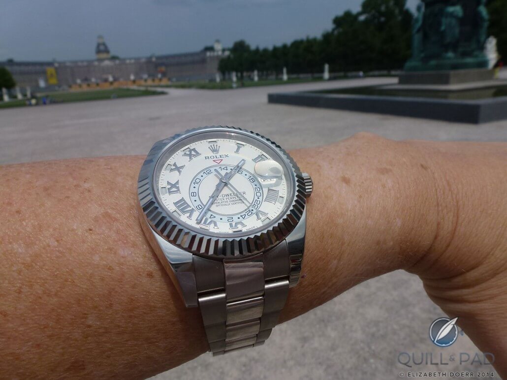Rolex Sky-Dweller on the wrist with Karlsruhe, Germany's baroque castle in the background, built in 1715