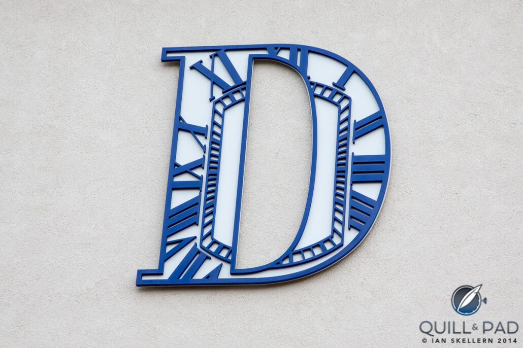 The Donzé logo looks like it could be the face of a sun dial