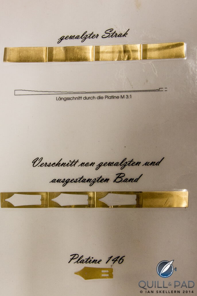 Fabrication of a Montblanc nib begins with flat blanks being stamped from bands of gold