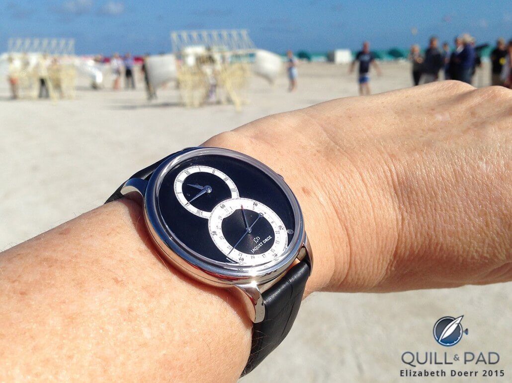 The Jaquet Droz Grande Séconde Quantième on the wrist at Miami Beach during Art Basel Miami with Theo Jansen’s Strandbeests just visible in the background