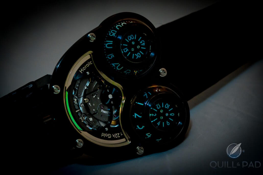 The lume on the indications of MB&F's Megawind FE glows blue under the camera flash, but green in the dark