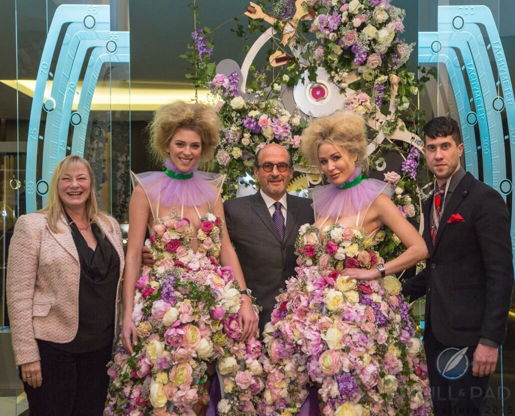 As well as the florally-attired stand personnel, Elizabeth Doerr, Richard Mille and Joshua Munchow enjoyed how things came up roses at the 2015 Richard Mille booth