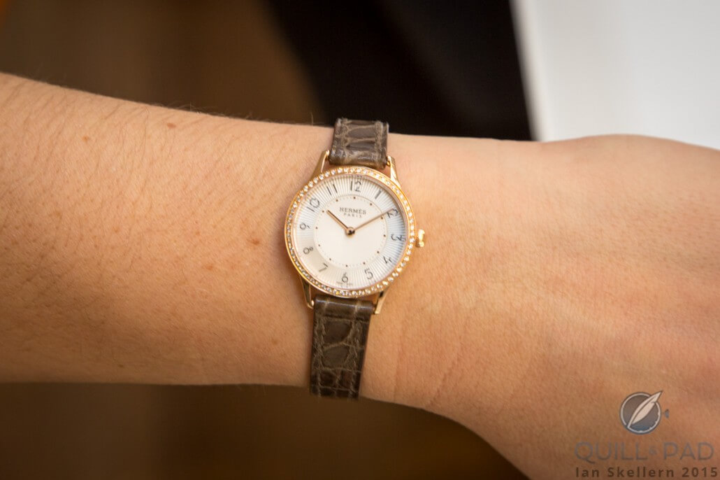 Slim d’Hermès 32 mm in red gold with diamond-set bezel on the wrist