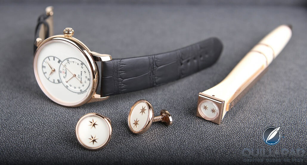 The complete Jaquet Droz line-up of ivory-colored accessories featuring watch, cufflinks, and pen