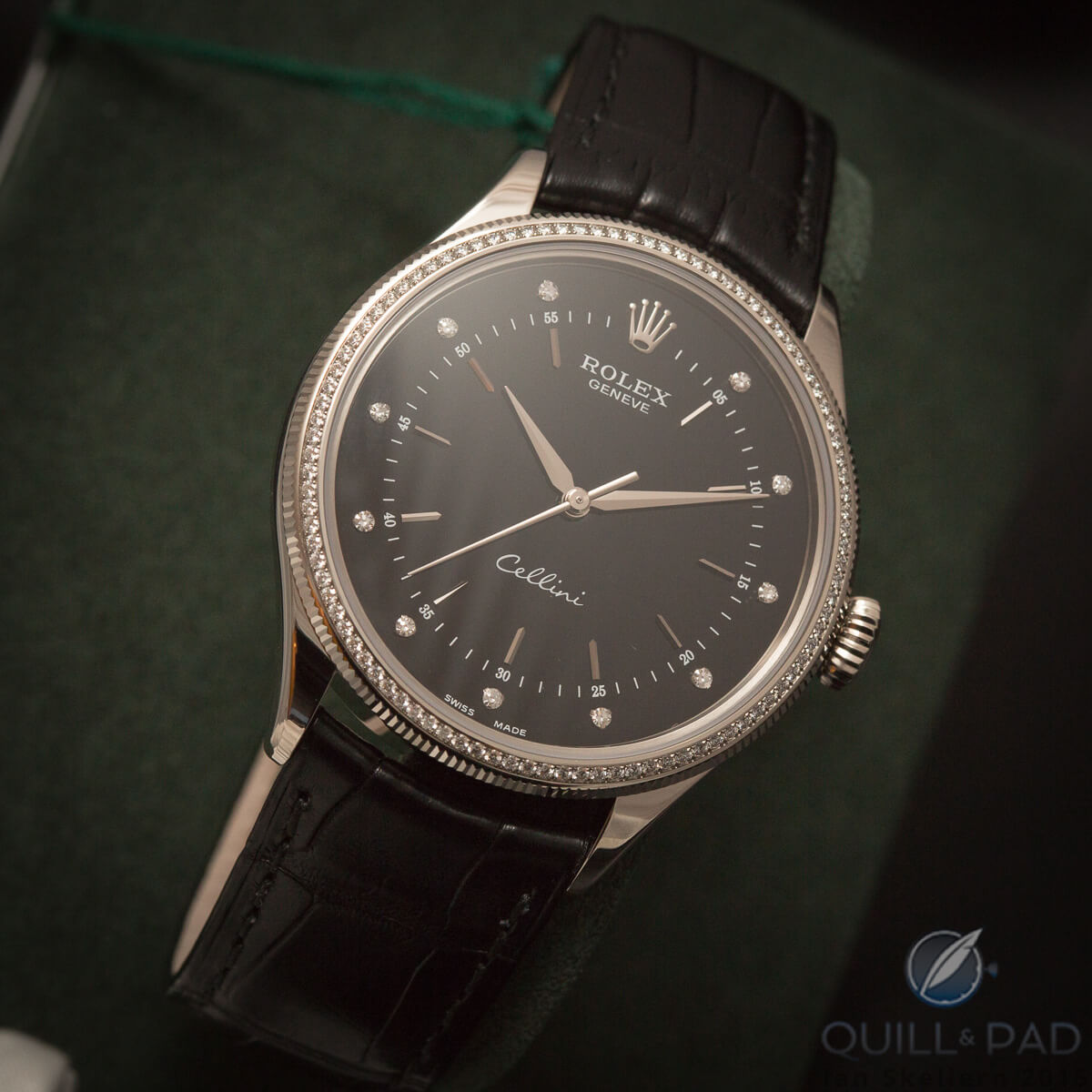 Rolex Cellini time-only with dark dial and diamond-set bezel