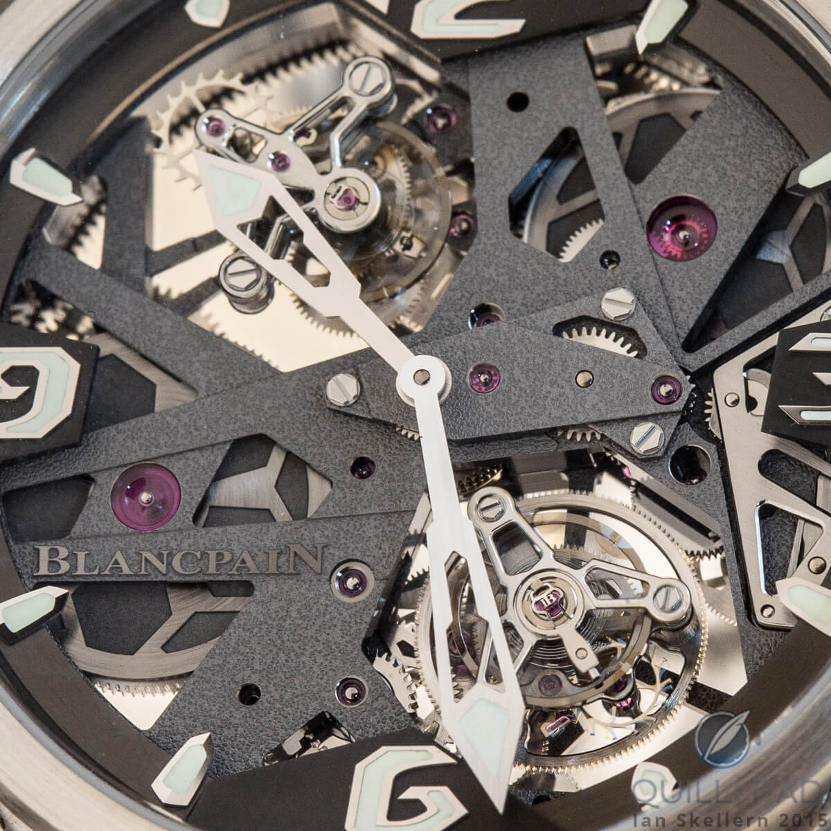 A close look at the dial side of the Blancpain L-evolution Tourbillon Carrousel: the tourbillon regulator is at the top of this image and the carrousel at the bottom