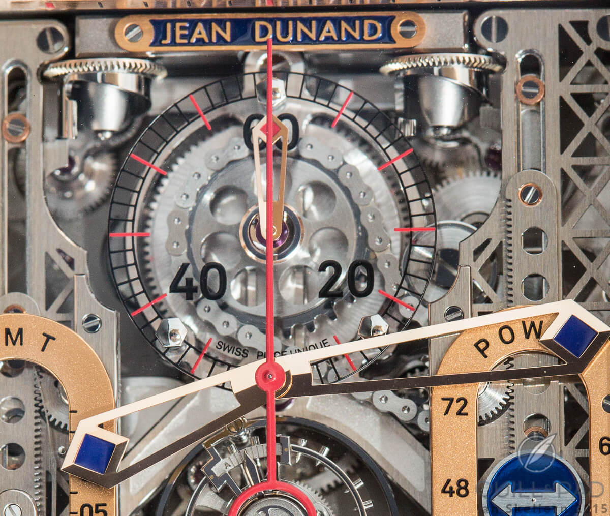 The chain that drives the power reserve indicator coming from the gear under the 60-minute chronograph counter; note the exquisitely crafted hour and minute hands on the Jean Dunand Palace