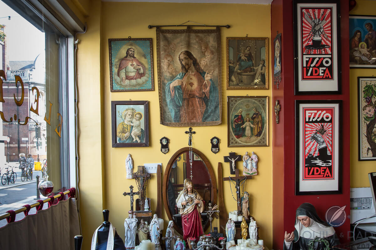 Religious iconography features prominently at Mo Coppoletta's The Family Business; the tattoo parlor is even located beside a large church