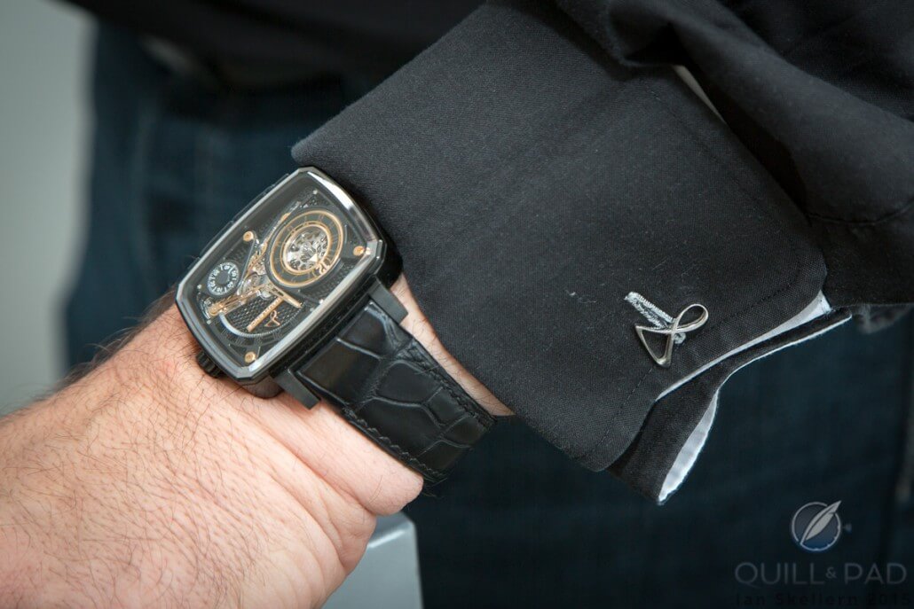 Hautlence HL Black Ceramic on the wrist of brand co-founder and CEO Guillaume Tetu. Nice cuff links in the form of the Hautlence logo