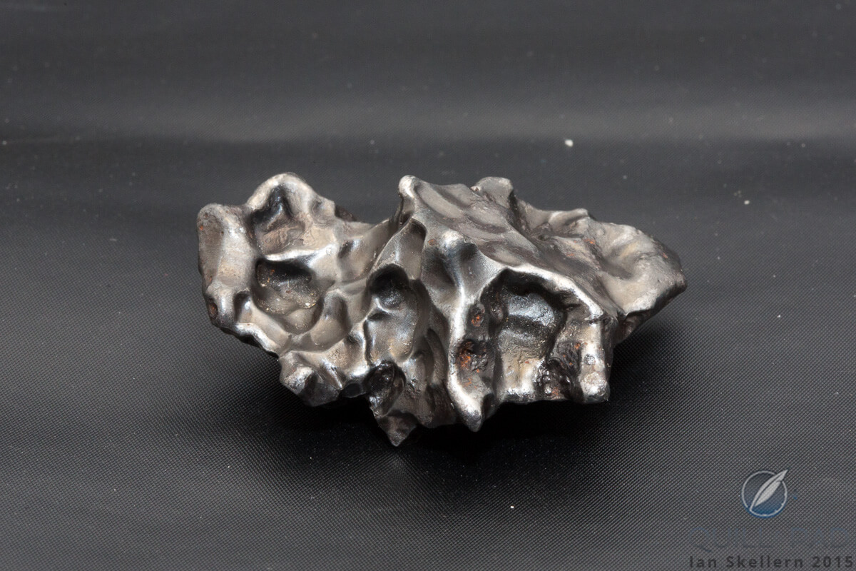 A fragment of meteorite originating in an asteroid belt between Mars and Jupiter