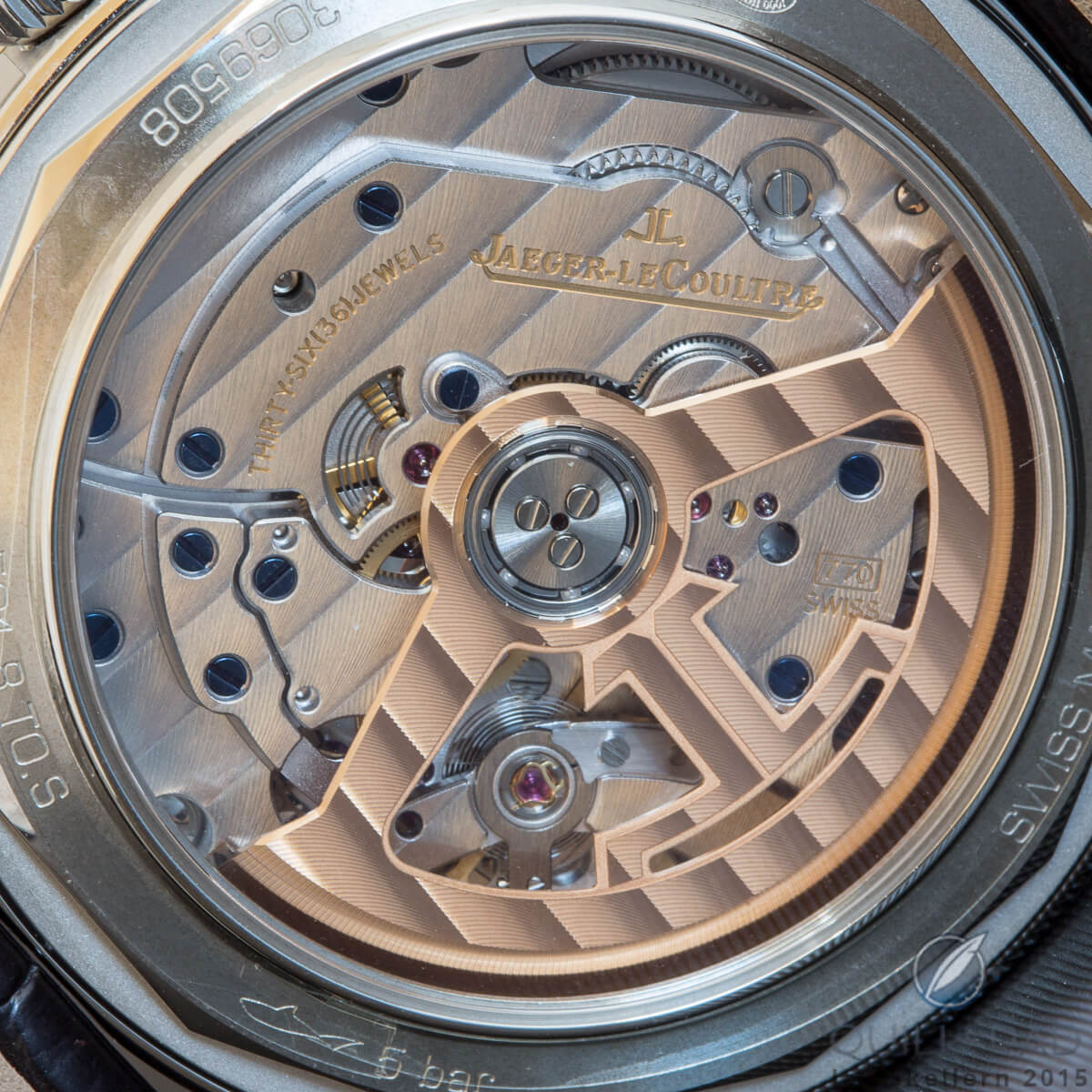 A close look at the beautifully finished Jaeger-LeCoultre Geophysic movement with the small dead seconds spring visible next to the center of the rotor