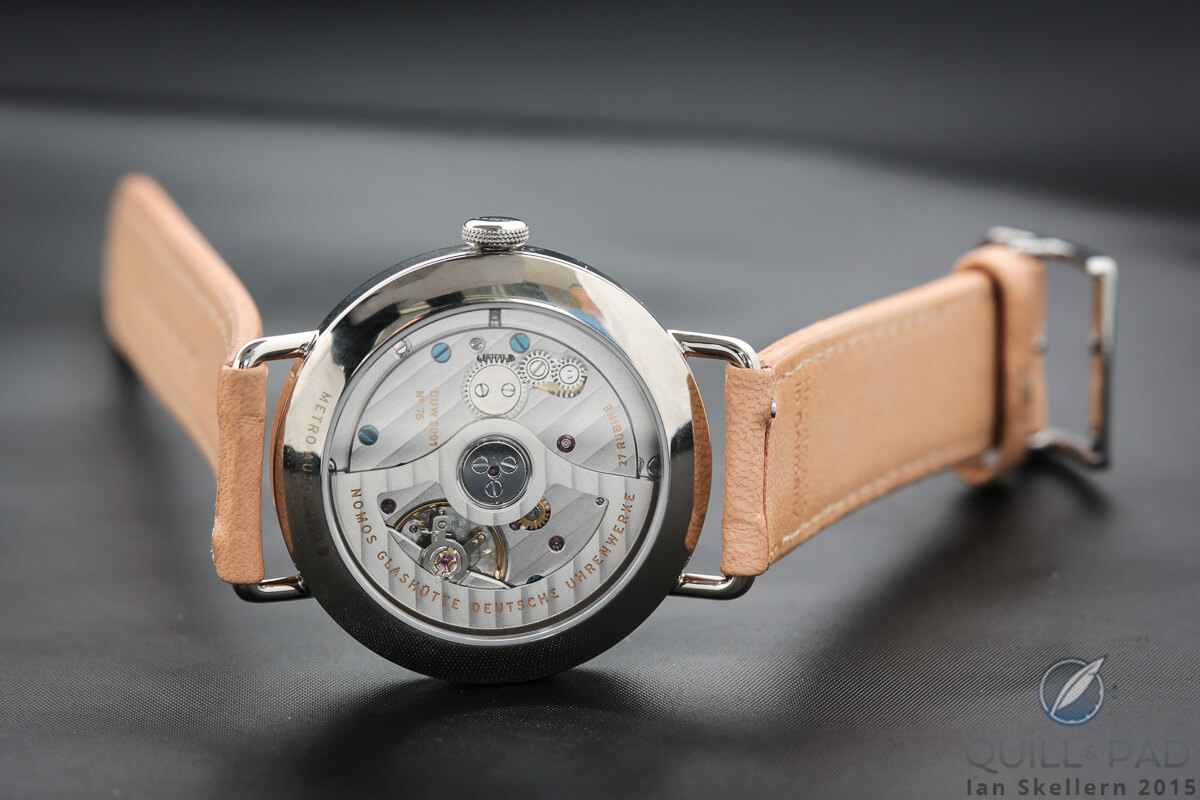 A look at the very aesthetic Caliber 3001 through the transparent case back of the Nomos Glashütte Neomatik Metro