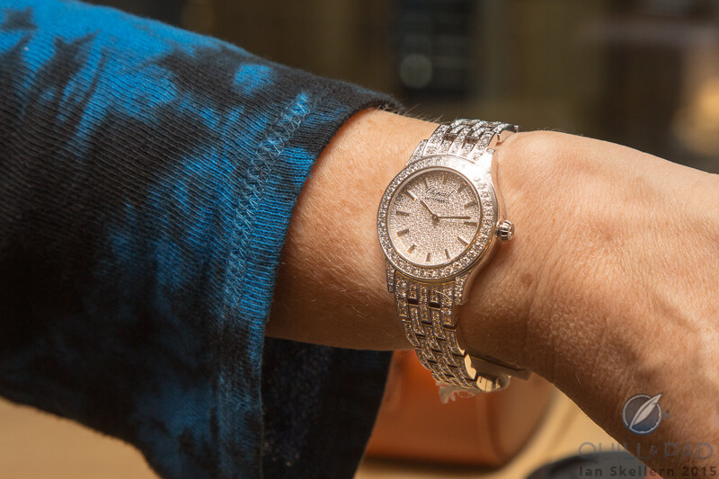 Trying on the Chopard Classic watch covered in 410 diamonds at the boutique in Geneva