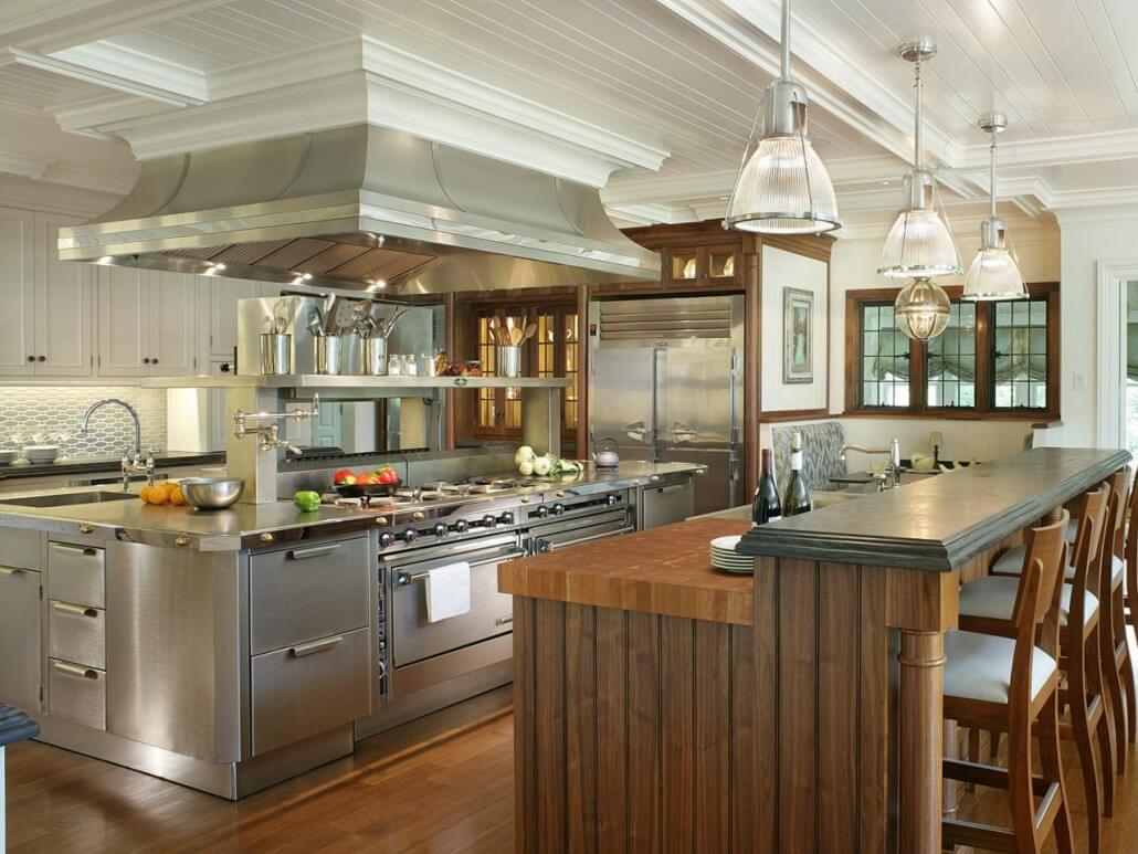 Modern stainless steel kitchen in a restored traditional hom
