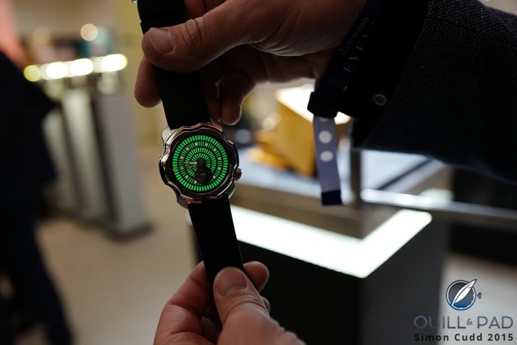 Crazy Finnish watchmaker/designer Stepan Sarpeneva showing off his lume at SalonQP 2015 with a gold-encased Northern Lights