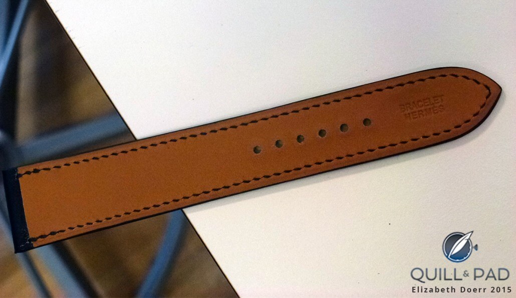 The author's completed Hermés leather watch strap after quality control and stamping