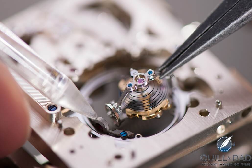 The watchmaker carefully places the regulator into the movement of the Jaeger-LeCoultre Reverso Tribute Gyrotourbillon