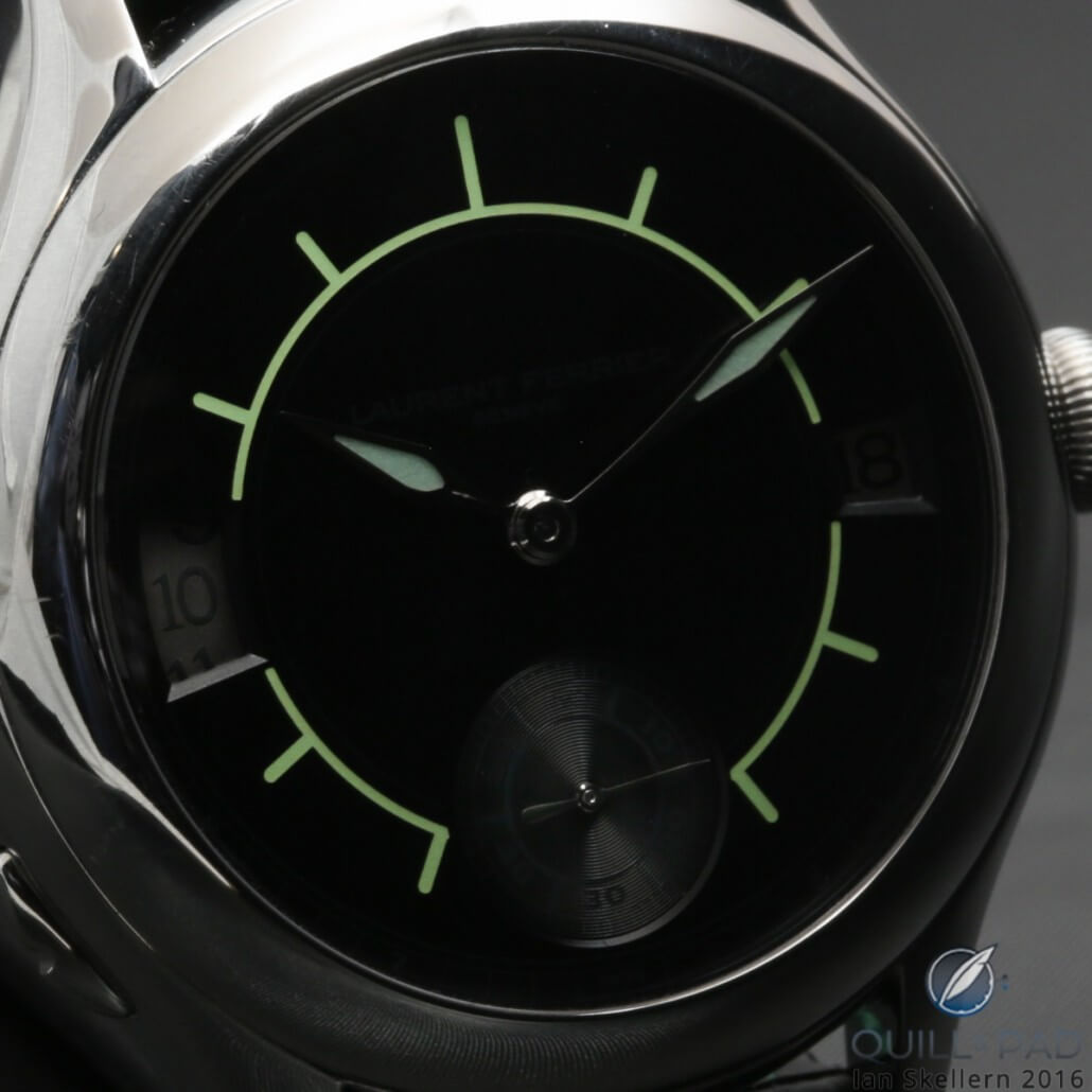 A close look at the dial of the Laurent Ferrier Galet Traveller Boréal in the dark