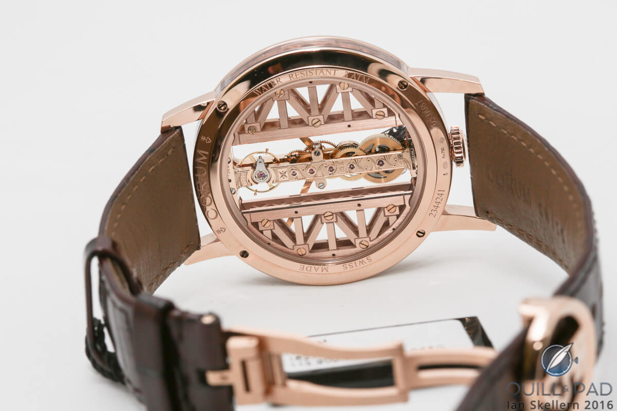 View through the display back of the Corum Golden Bridge Ronde in red gold