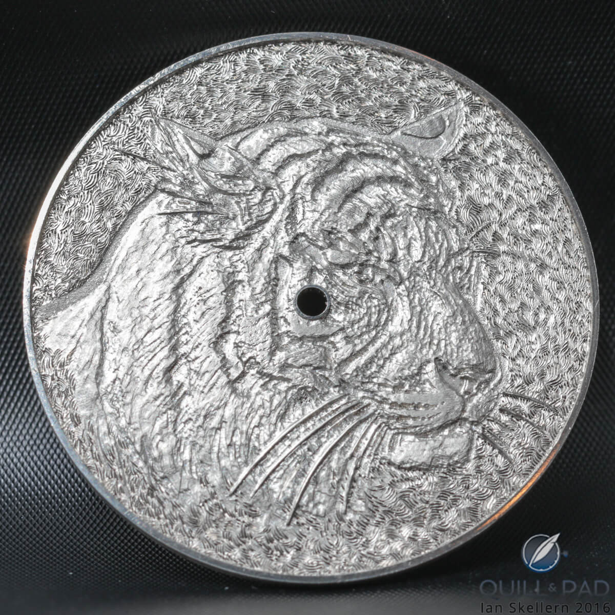 An engraved dial (before enameling) of the Hermès Arceau Tigre