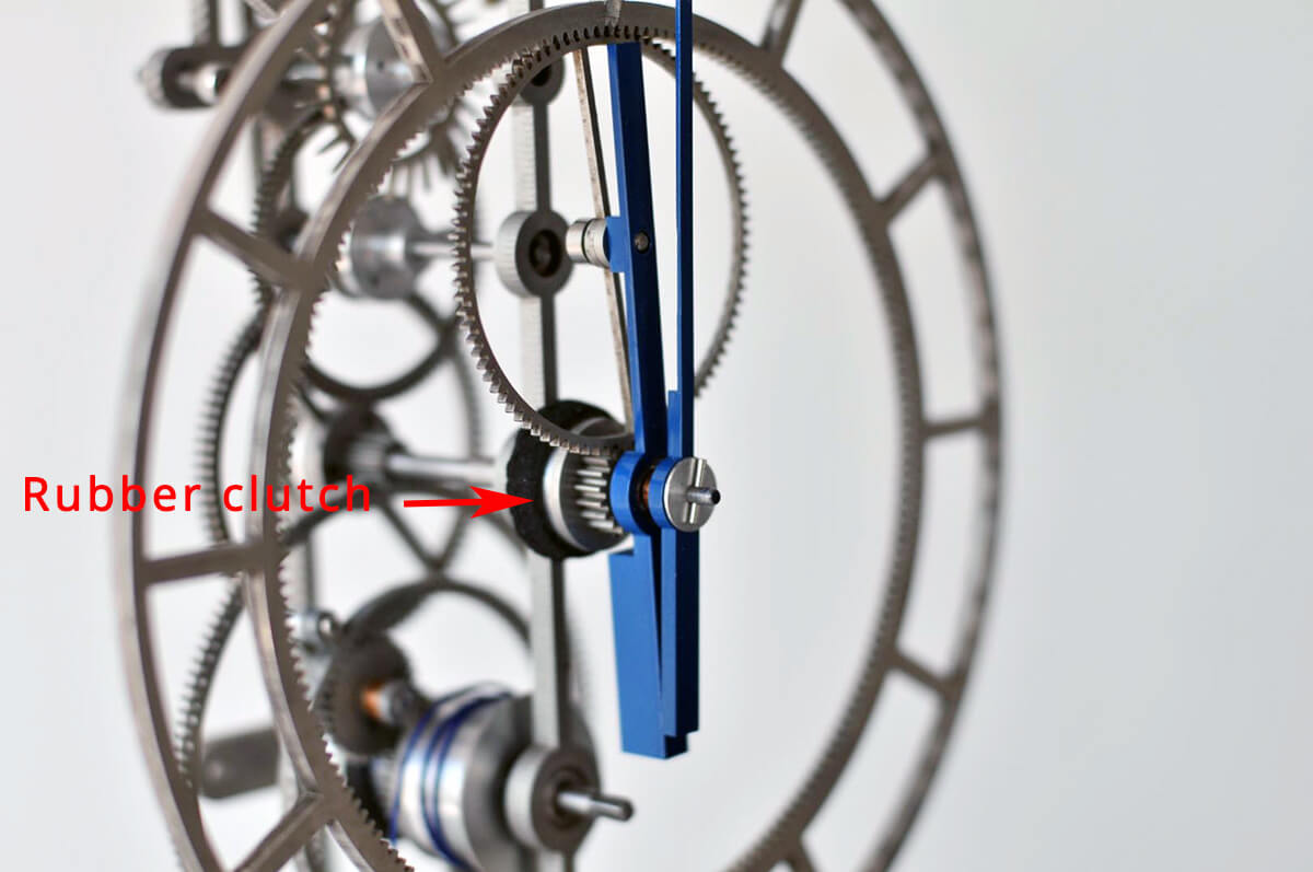 Elastomer friction clutch (like thick rubber) on the Gato movement enables setting the time while the movement is running