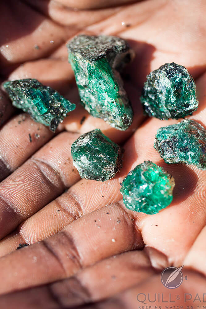 Gemfields emeralds in the hand (photo courtesy Adrian Fisk-Kagem)