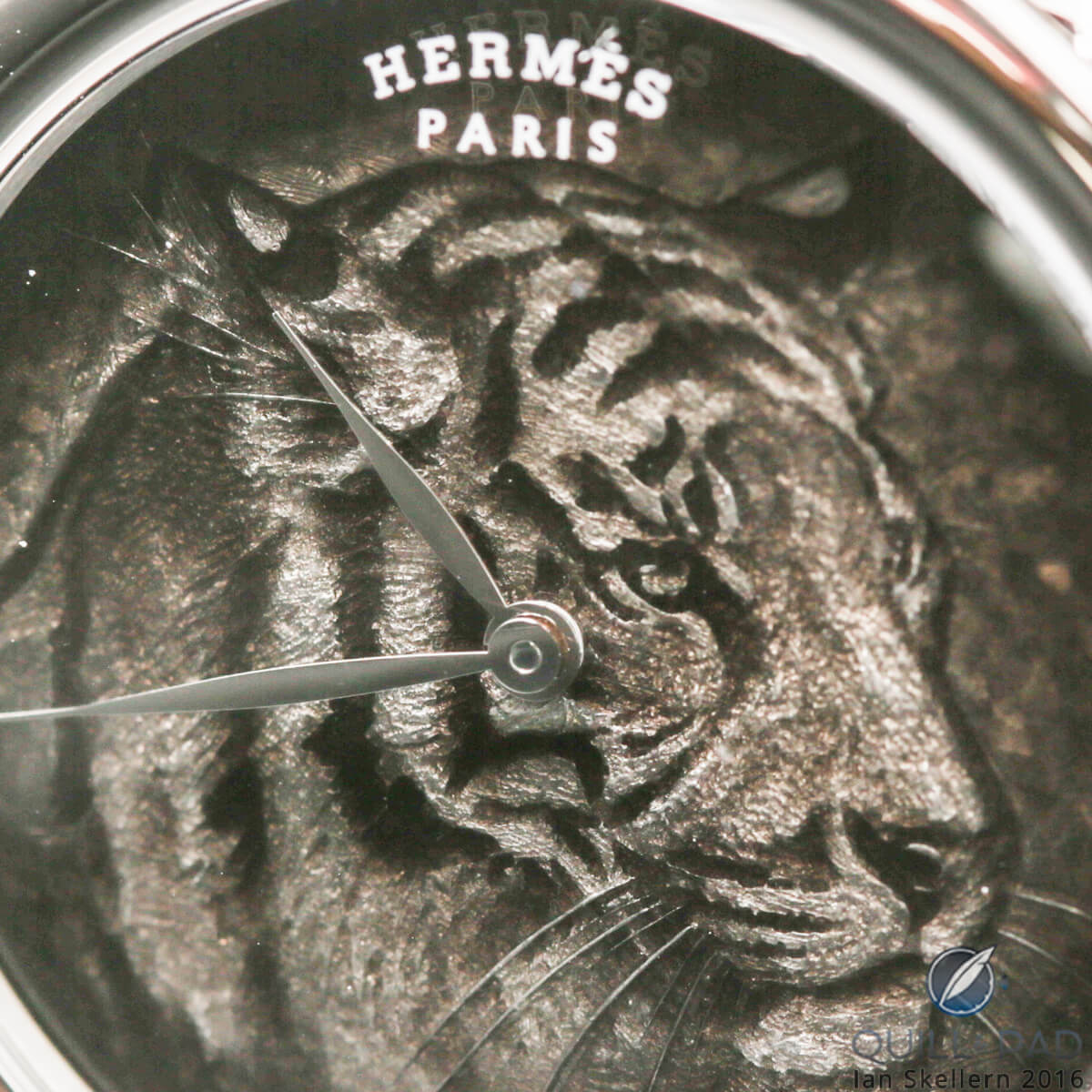 A close look at the encased dial of the Hermès Arceau Tigre Email Ombrant