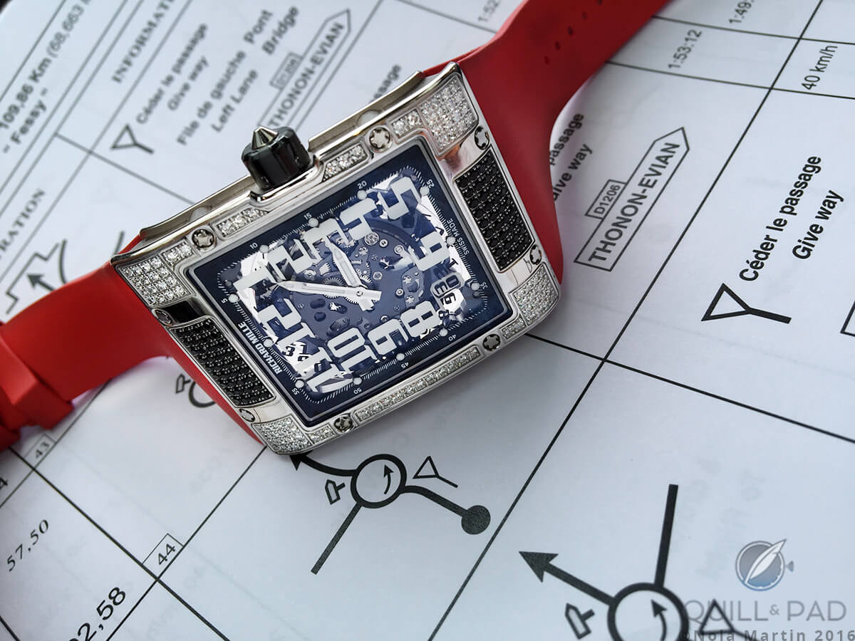 Hieroglyphic-like directions in the 2016 Princess Rally road book form a backdrop to the diamond-set Richard Mille RM 016 Extra Flat