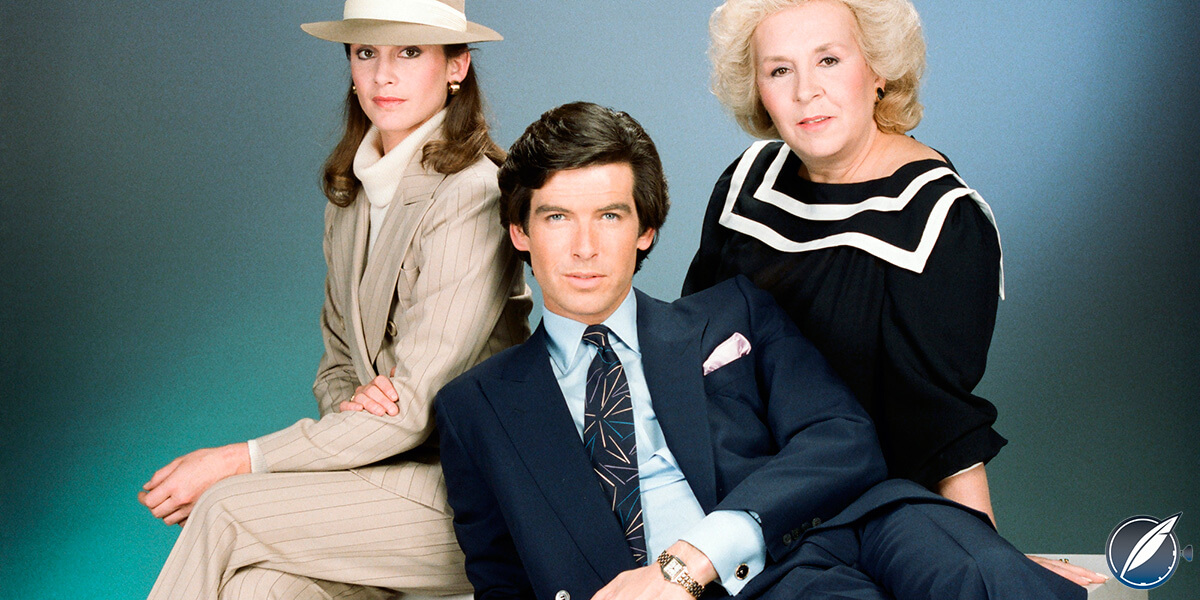 Pierce Brosnan as Remington Steele wearing a Cartier Panthère with co-stars Doris Roberts (right) and Stephanie Zimbalist (left)