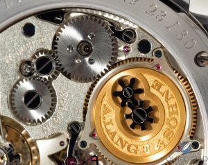 Close up look at the beautifully finished movement of the Tremblage engraving on the white-gold dial of the A. Lange & Söhne Zeitwerk Handwerkskunst (photo courtesy Phillips auctions)