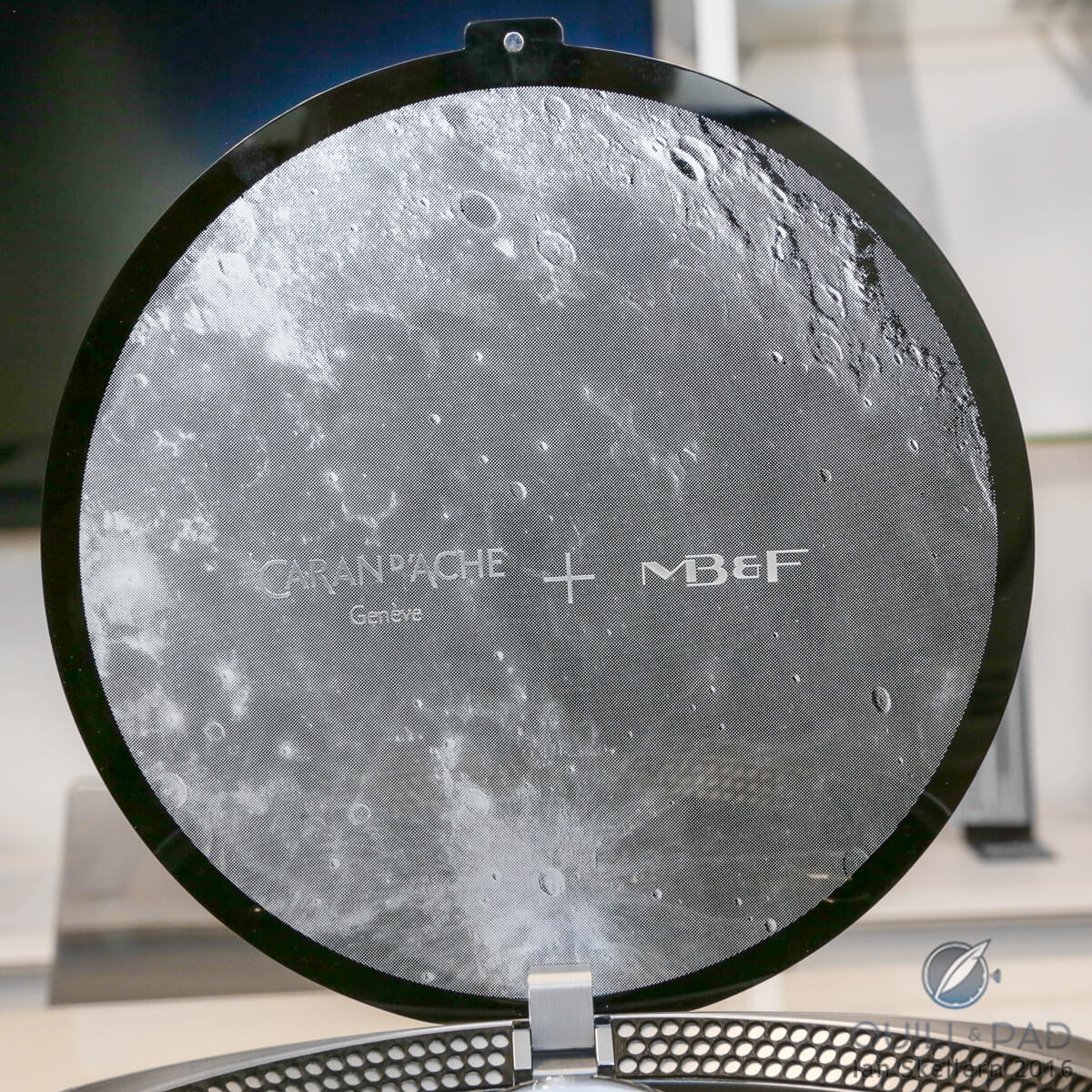 The inner lid of the Astrograph's landing pad case features a close up view of the Moon's surface