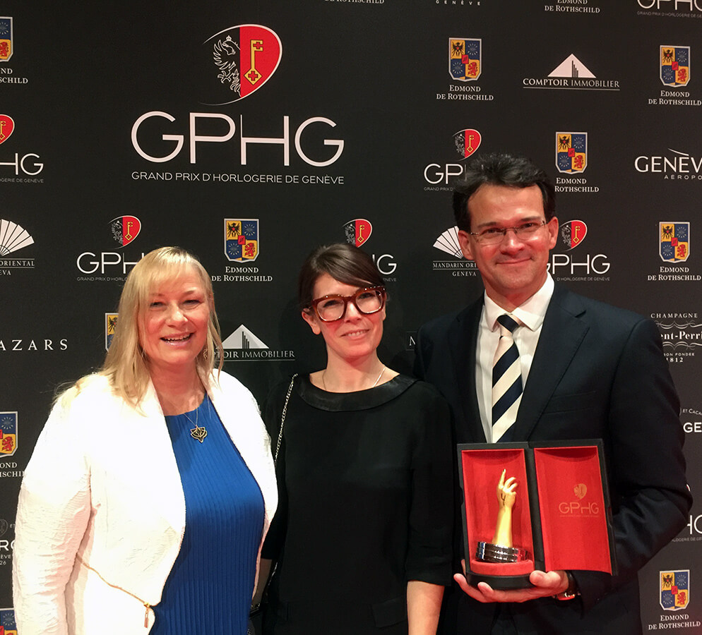 Elizabeth Doerr congratulating Fabergé's Aurélie Picaud and Aean Gilberston on winning Best Travel Time Watch at the 2016 Grand Prix d’Horlogerie de Genève