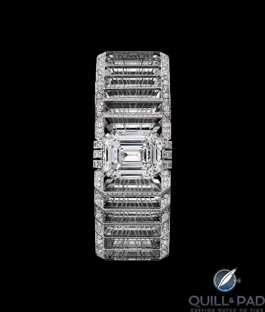 Illumination bracelet in white gold with one 31.16-carat D IF type IIa emerald-cut diamond, one 0.80-carat D VS2 and one 0.77-carat D VVS1 trapezoid-shaped step-cut diamonds, carved rock crystal, calibré-cut diamonds, brilliant-cut diamonds. The diamond can be worn on a ring and be replaced by a pavé-set motif
